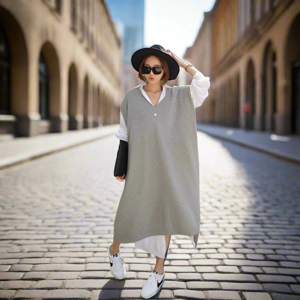 
                      
                        Long vest jacket over knee dress
                      
                    