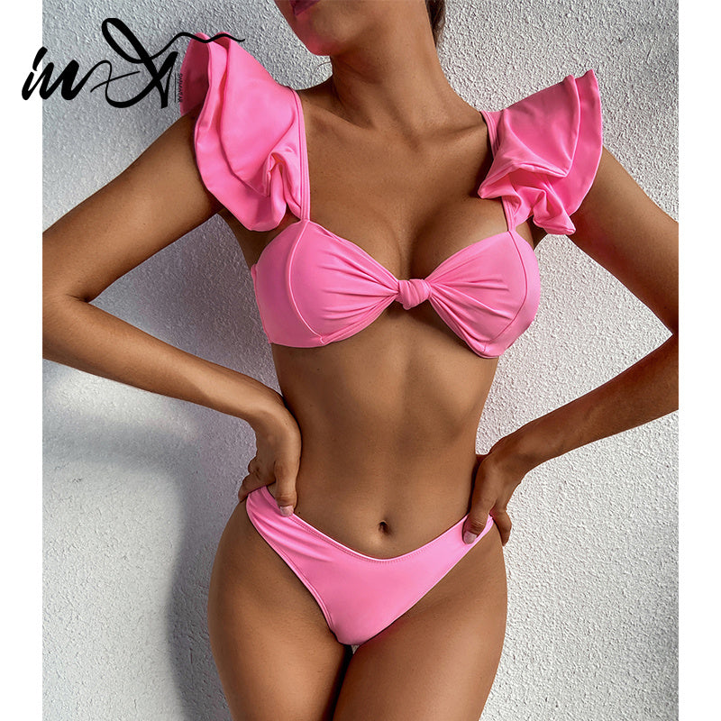 
                      
                        Solid Color Ruffle Swimsuit (2 Piece Sets)
                      
                    