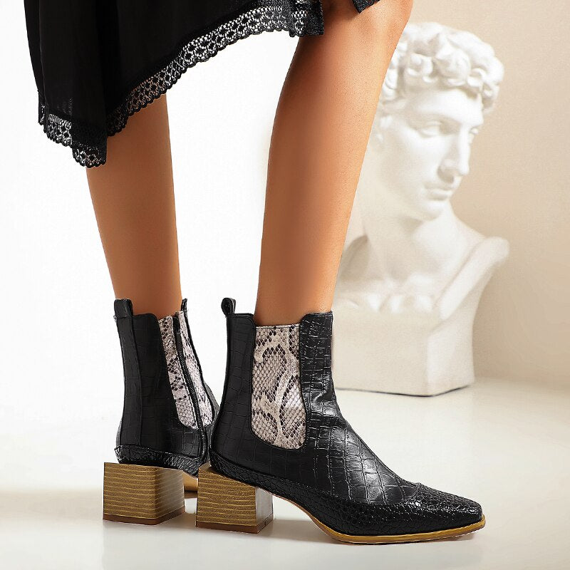 
                      
                        New retro women's boots snake print
                      
                    